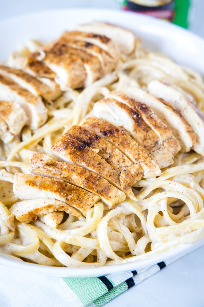 cajun alfredo with chicken on top