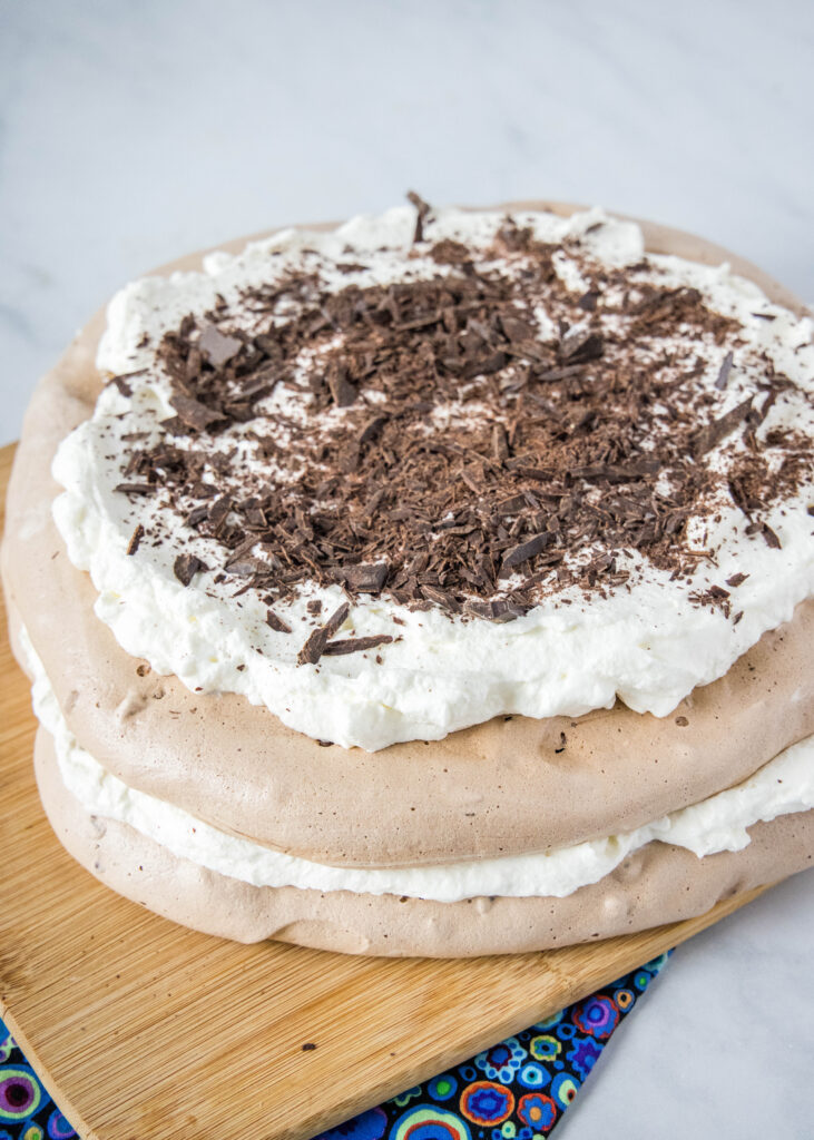 chocolate pavlova cake with whipped cream