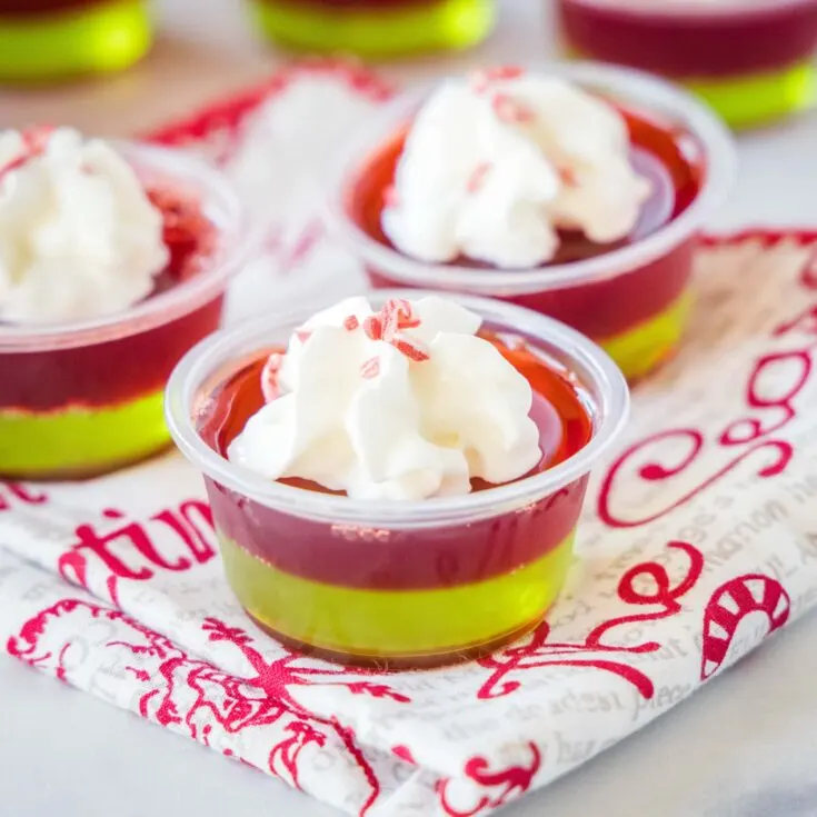 close up christmas jello shots with whipped cream