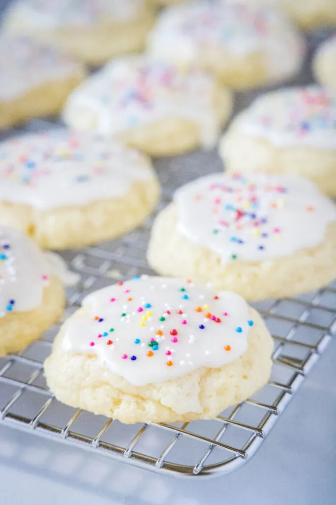 sour cream cookies on a cooling rack