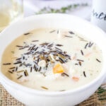 close up wild rice soup in a white bowl