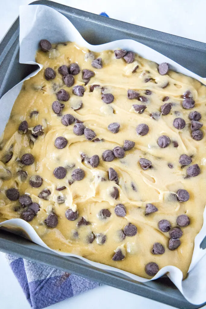 chocolate chip blondie batter in baking pan