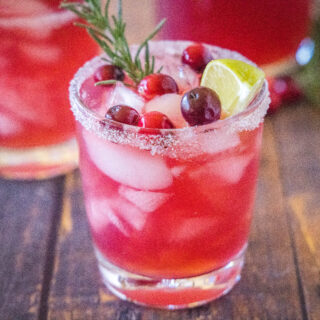 cropped image of cranberry margarita in a glass