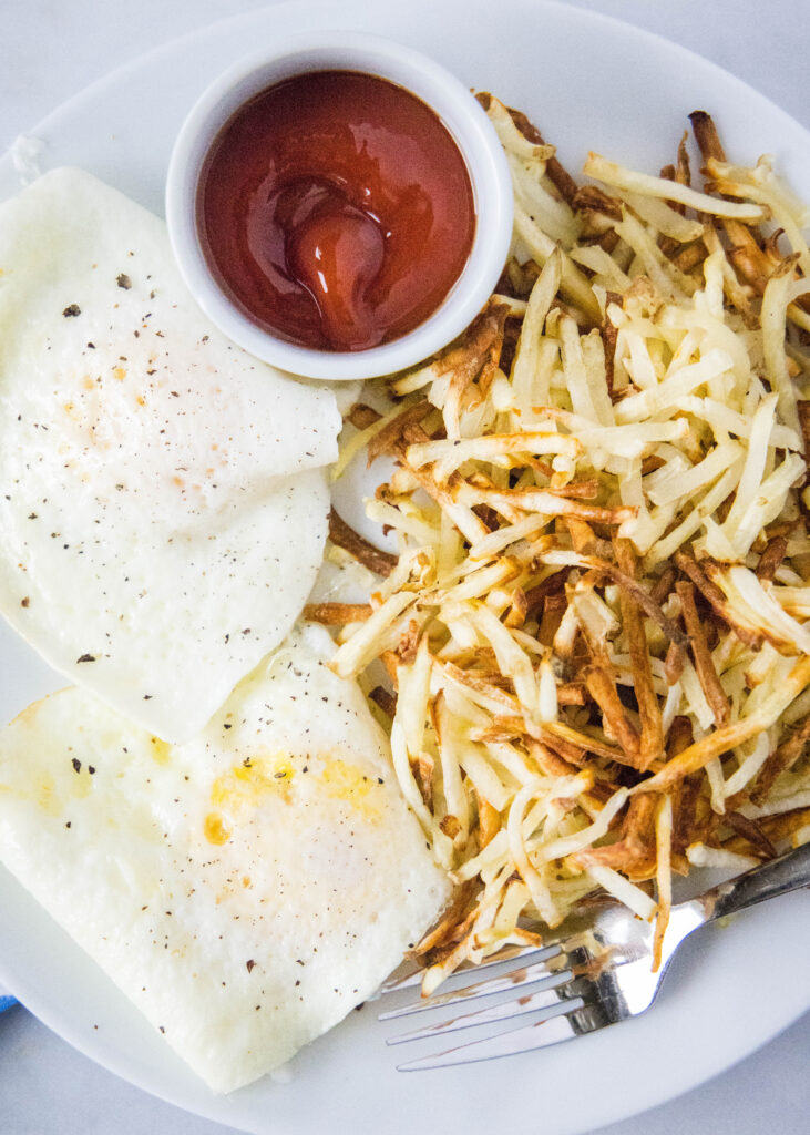 eggs and hash browns on a plate