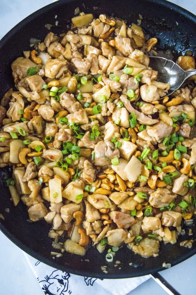 Cashew chicken in a large skillet