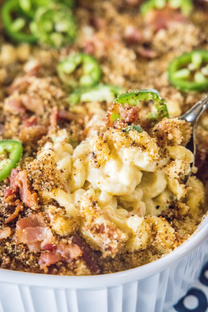 Scoop macaroni and cheese out of a casserole dish