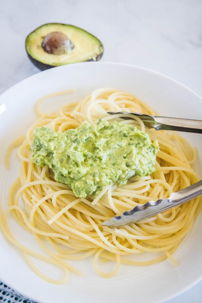 add avocado sauce to cooked pasta