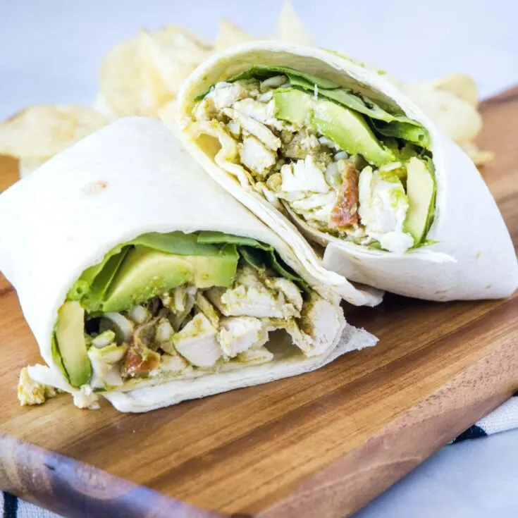 cropped close up chicken wrap with pesto