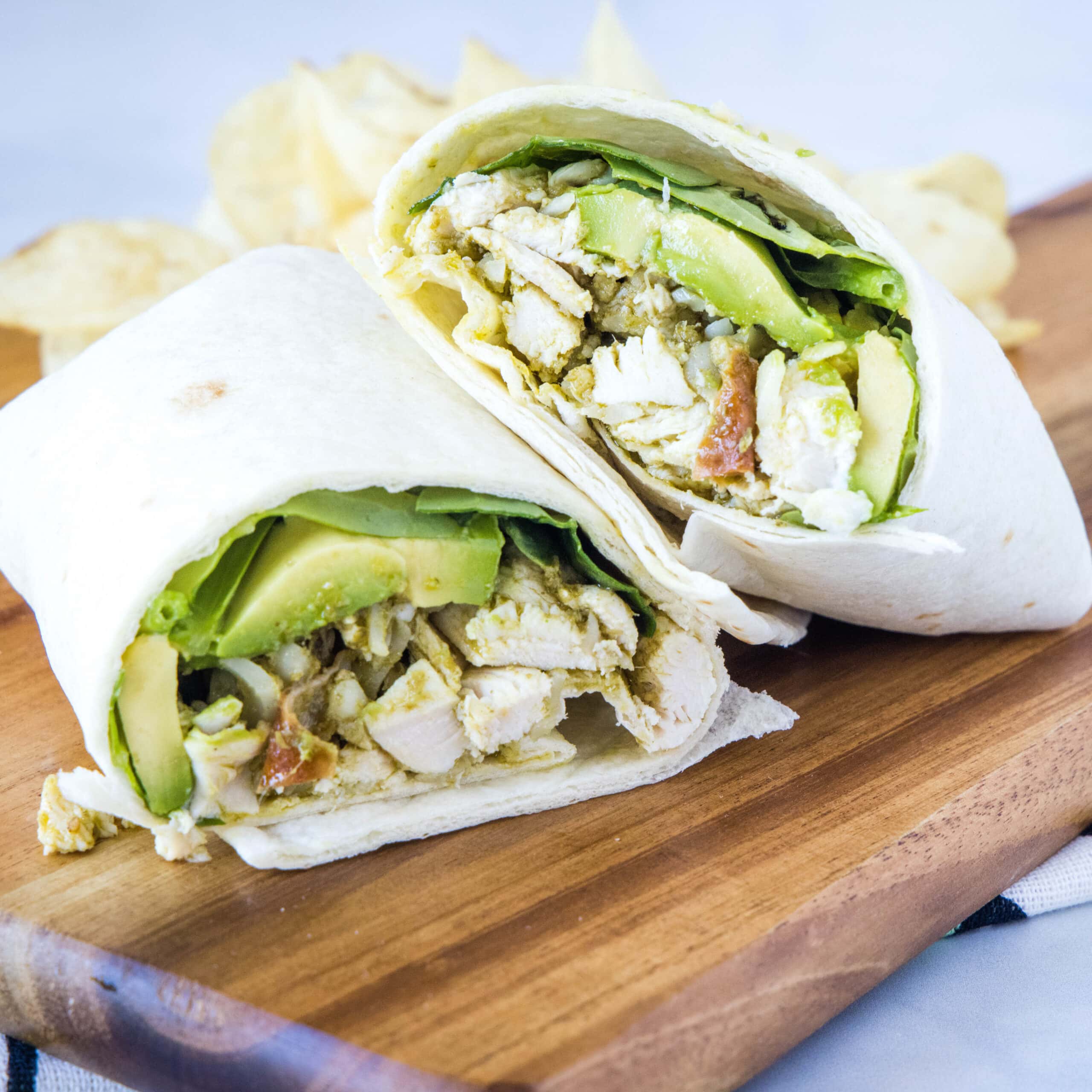 cropped close up chicken wrap with pesto
