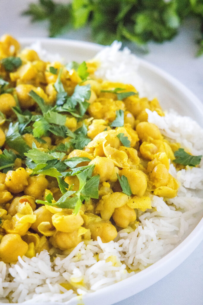 Chickpea curry on white rice on a plate