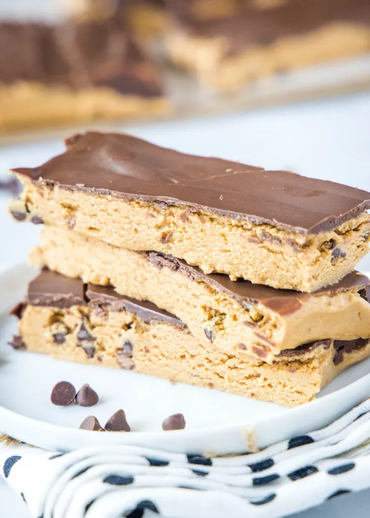 stacked homemade perfect bars on a white plate