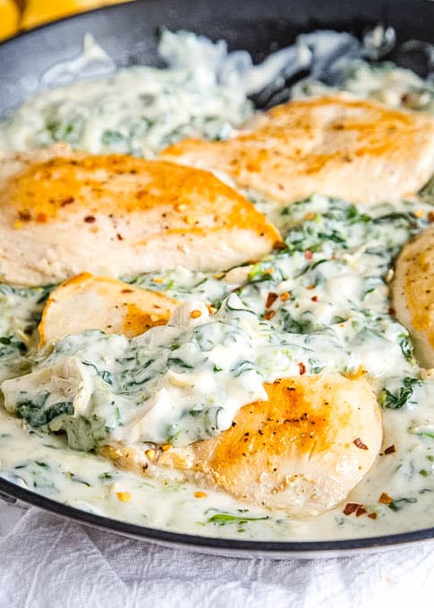 spinach and artichoke sauce on chicken