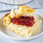 biscuit with jelly on a white plate