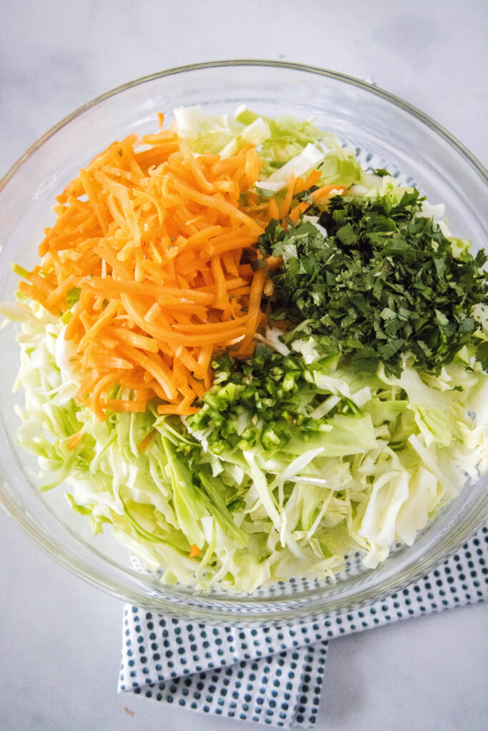 mixing everything together for coleslaw
