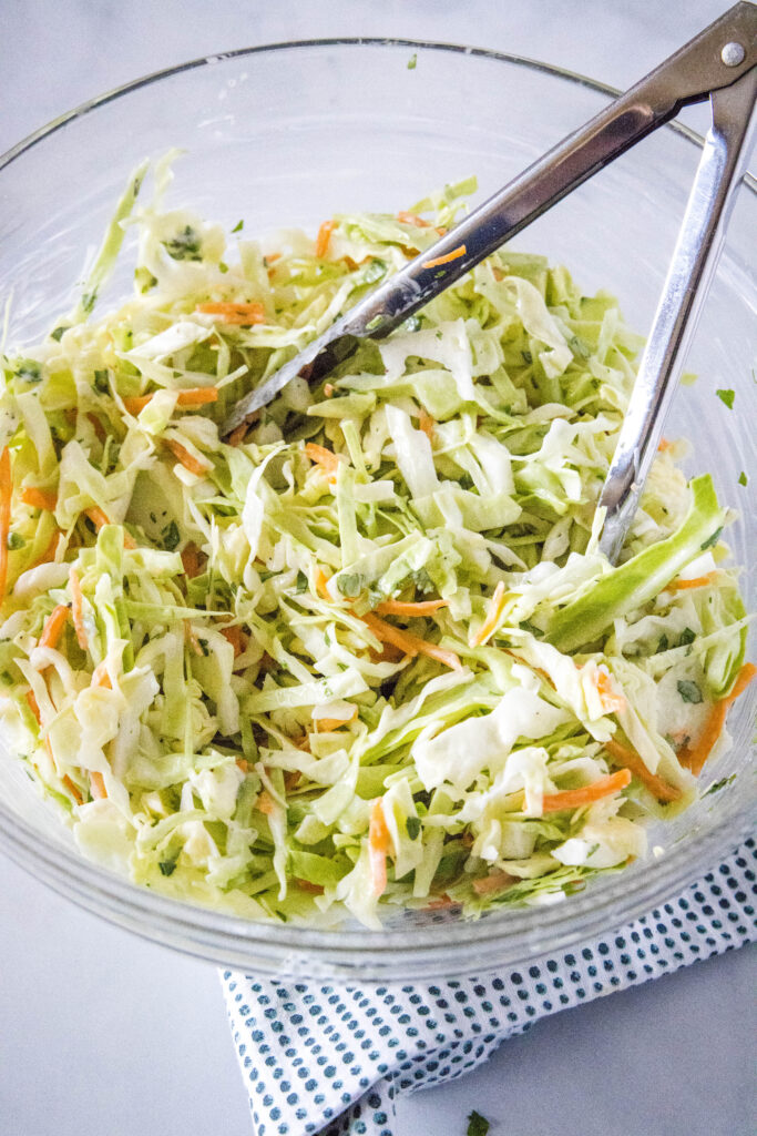 mexican coleslaw in a mixing bowl