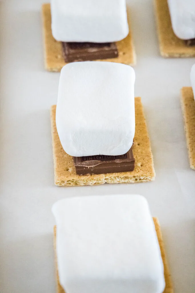 crackers, topped with chocolate and mashrmallows