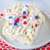 close up rice krispie treats with red and blue sprinkles