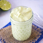 close up jar of avocado dressing