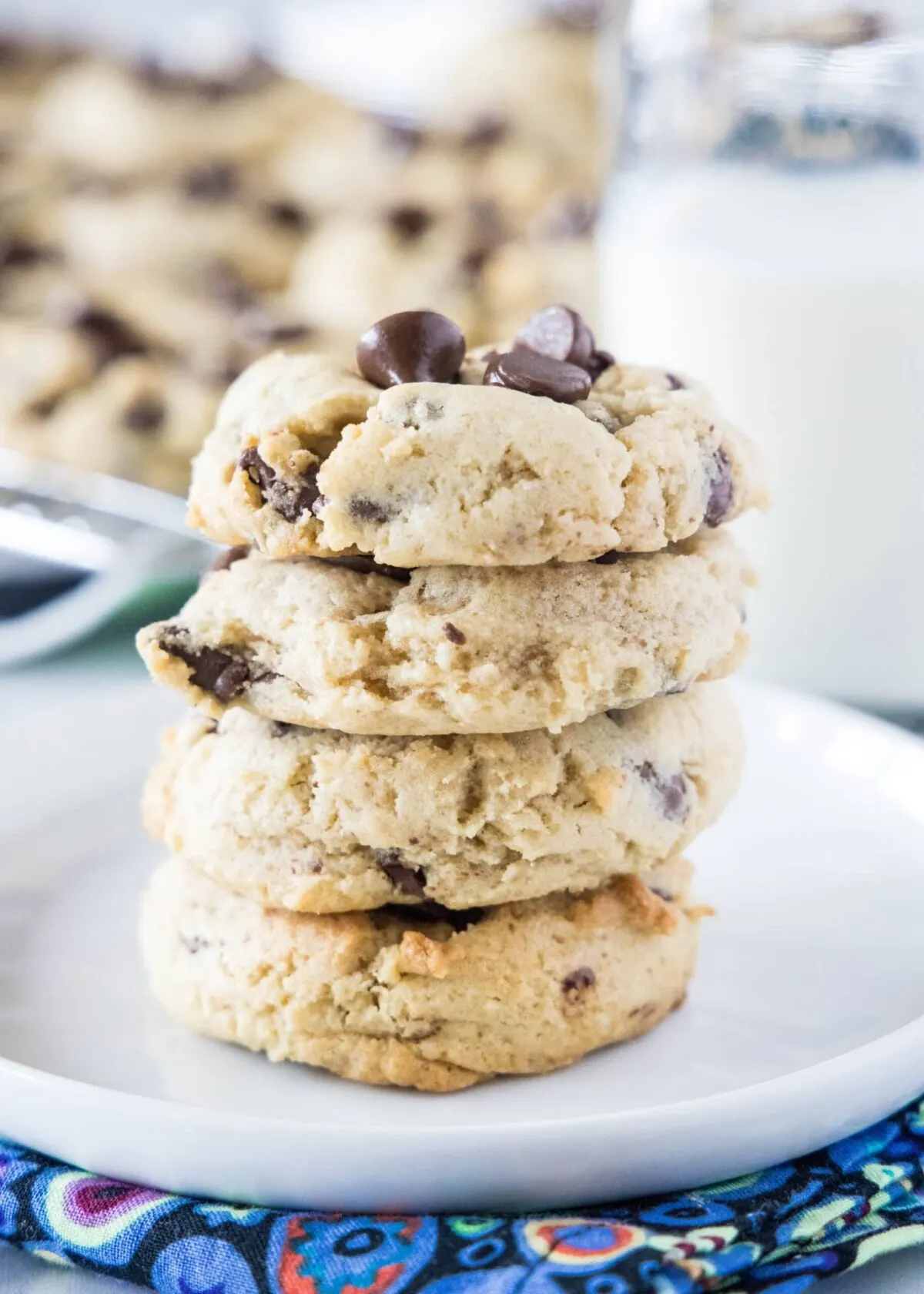 A stack of four chocolate chip cookies