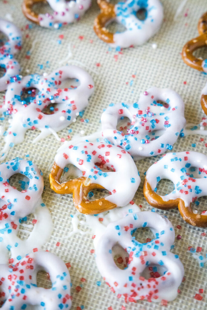 white chocolate on pretzels with sprinkles