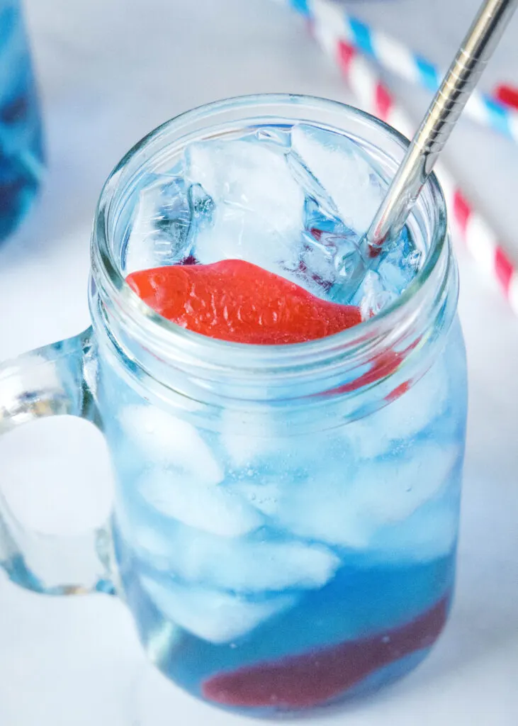 ocean water drink in a glass with straw