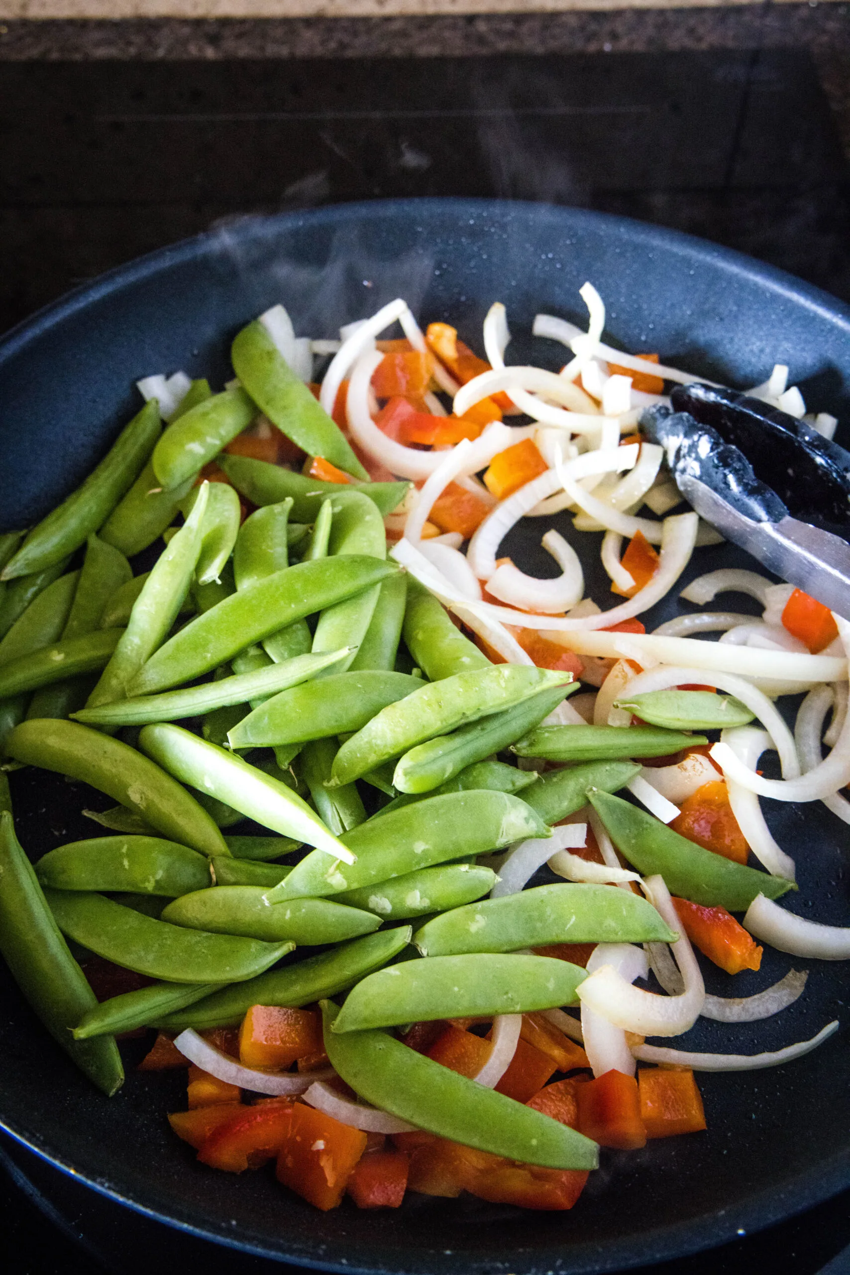 stir fry veggies in a pan