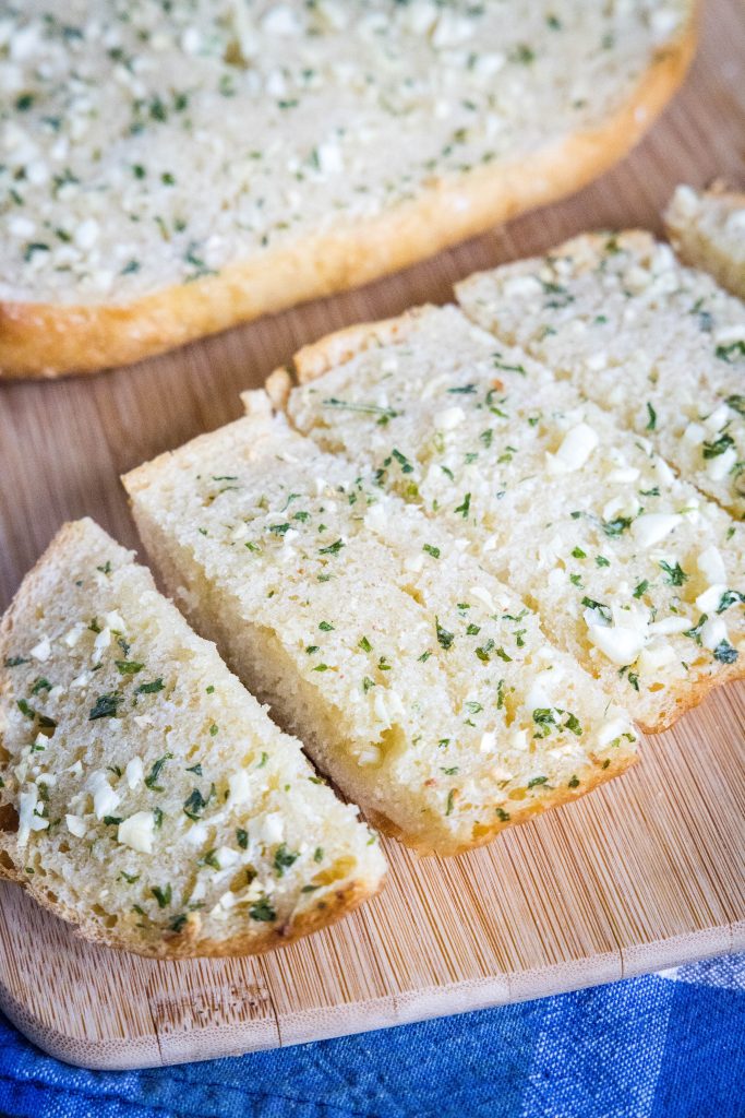 garlic bread on a cutting board