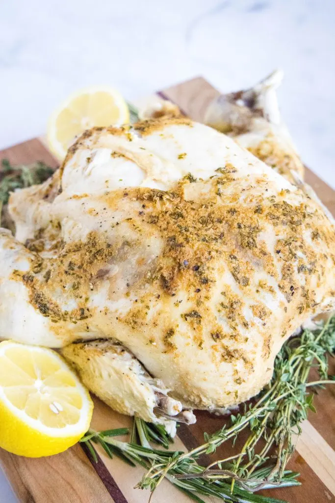 instant pot whole chicken on a cutting board