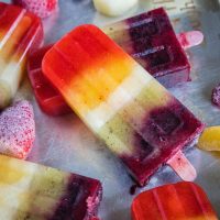 cropped close up rainbow popsicles for on a baking tray