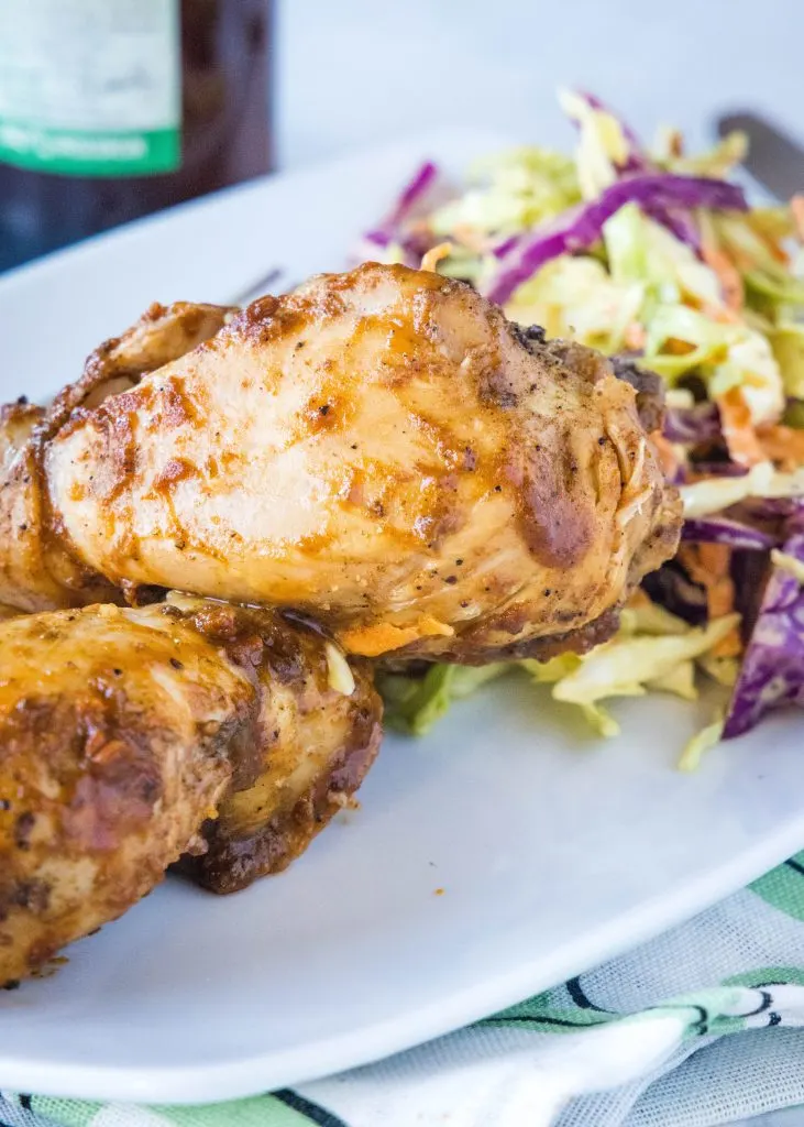 Close-up of chicken drumsticks with barbecue sauce