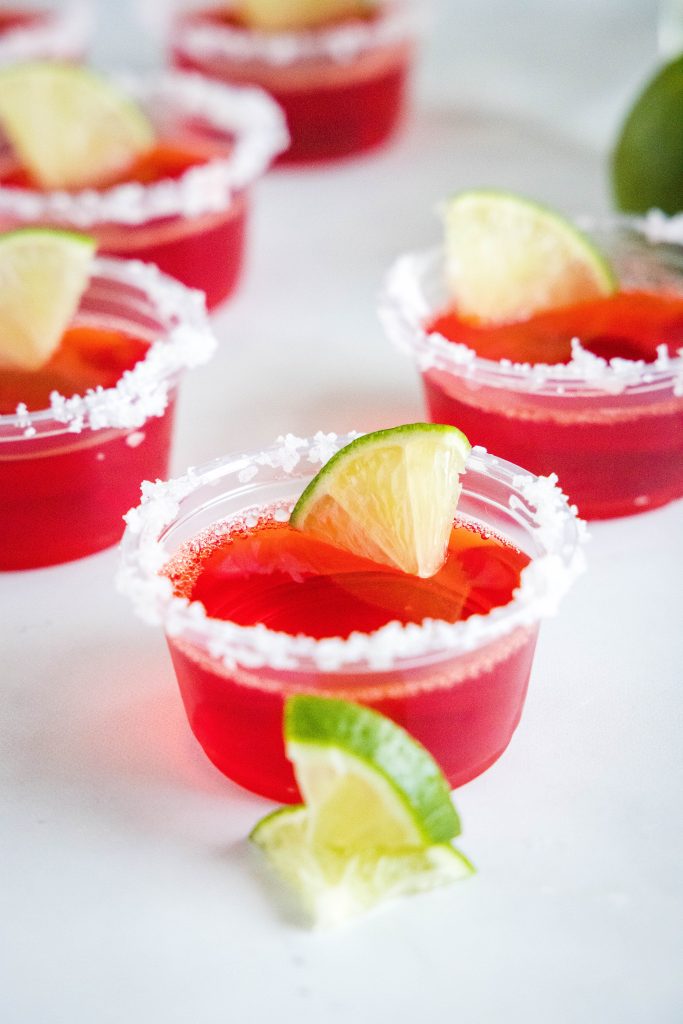 margarita jello shots with lime on a table