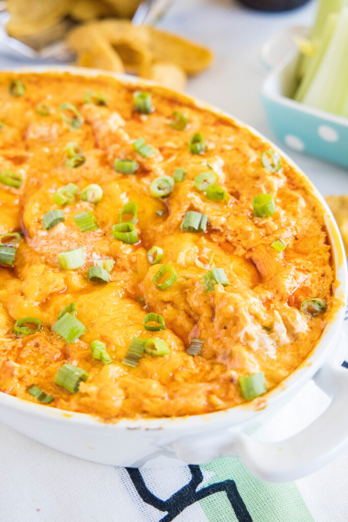 cheesy buffalo chicken dip in a serving dish