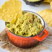 cropped close up bowl of guacamole