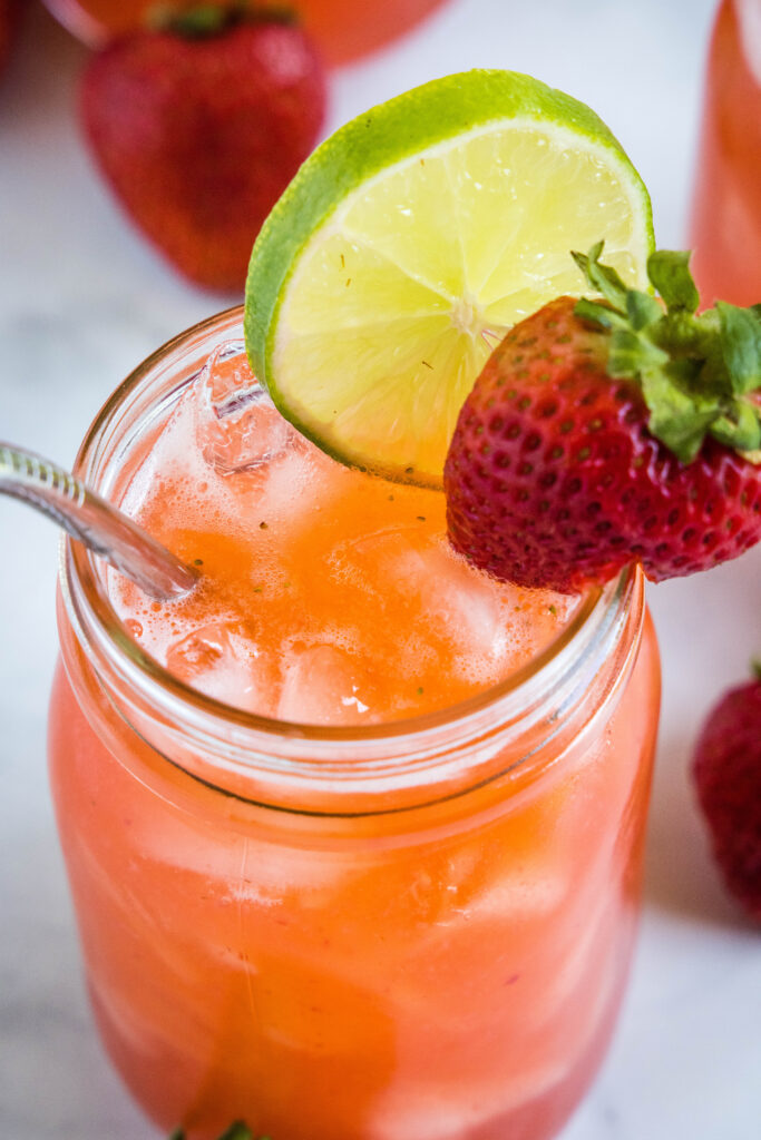 This quick and refreshing Strawberry Agua Fresca is about to make your summertime way cooler! Sweetened with real sugar and flavored with fresh lime, this classic drink will be a seasonal favorite for all ages and occasions.