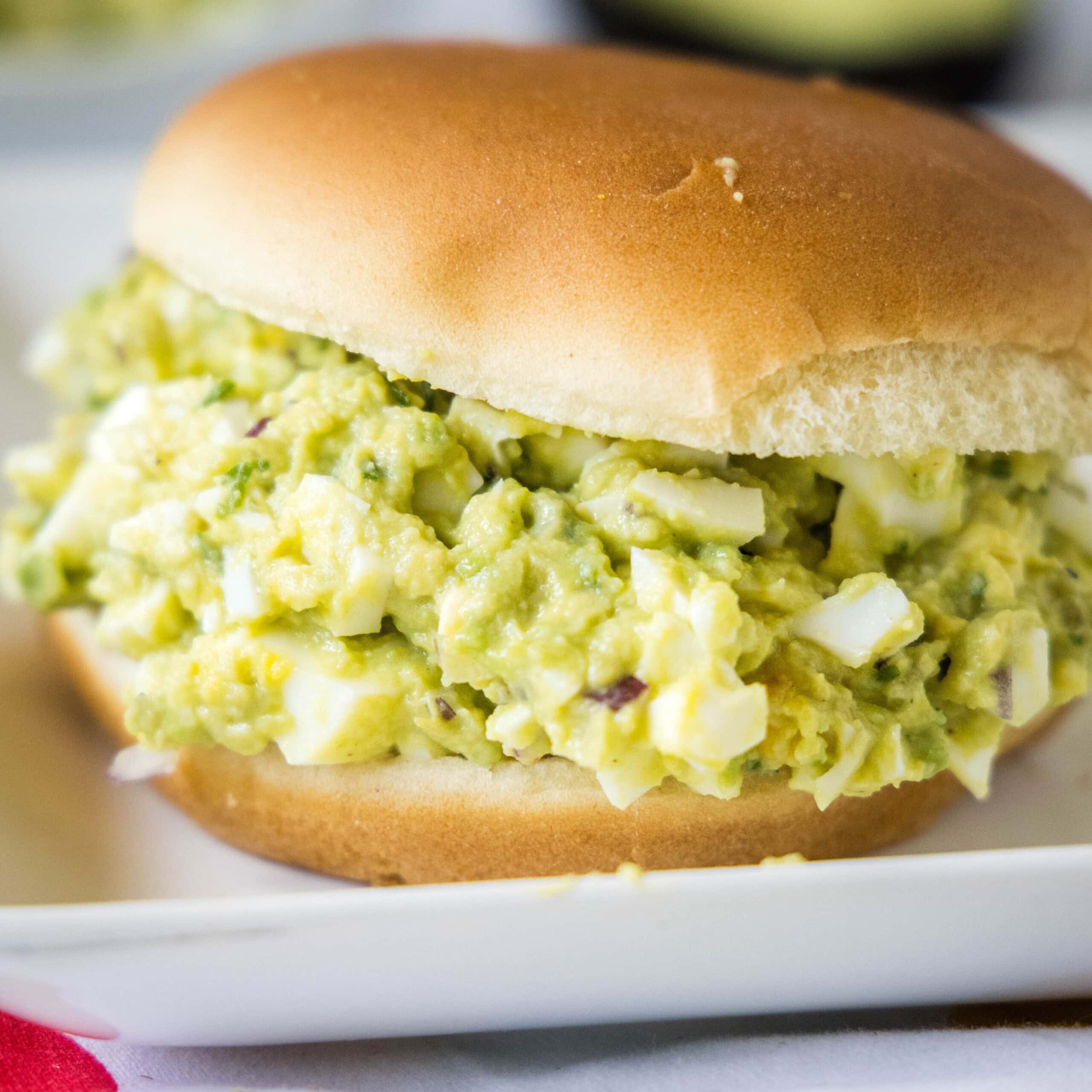avocado egg salad on a bun close up