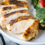 cropped close up sliced blackened chicken