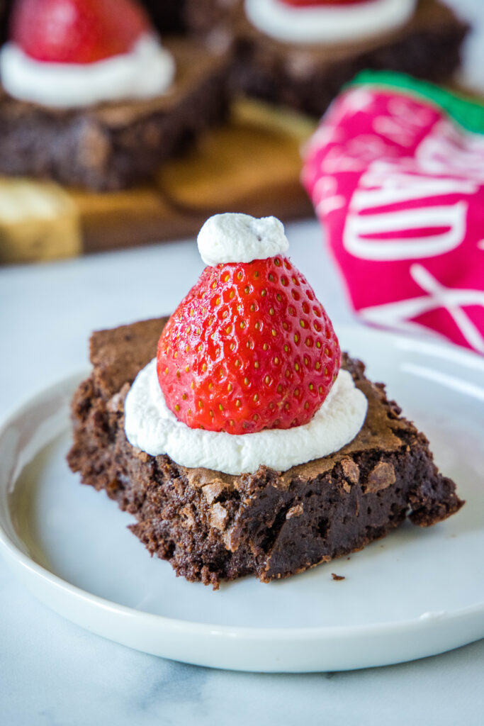 santa hat brownie on a white plate
