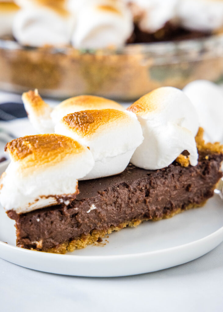 slices of s'mores pie on a white plate