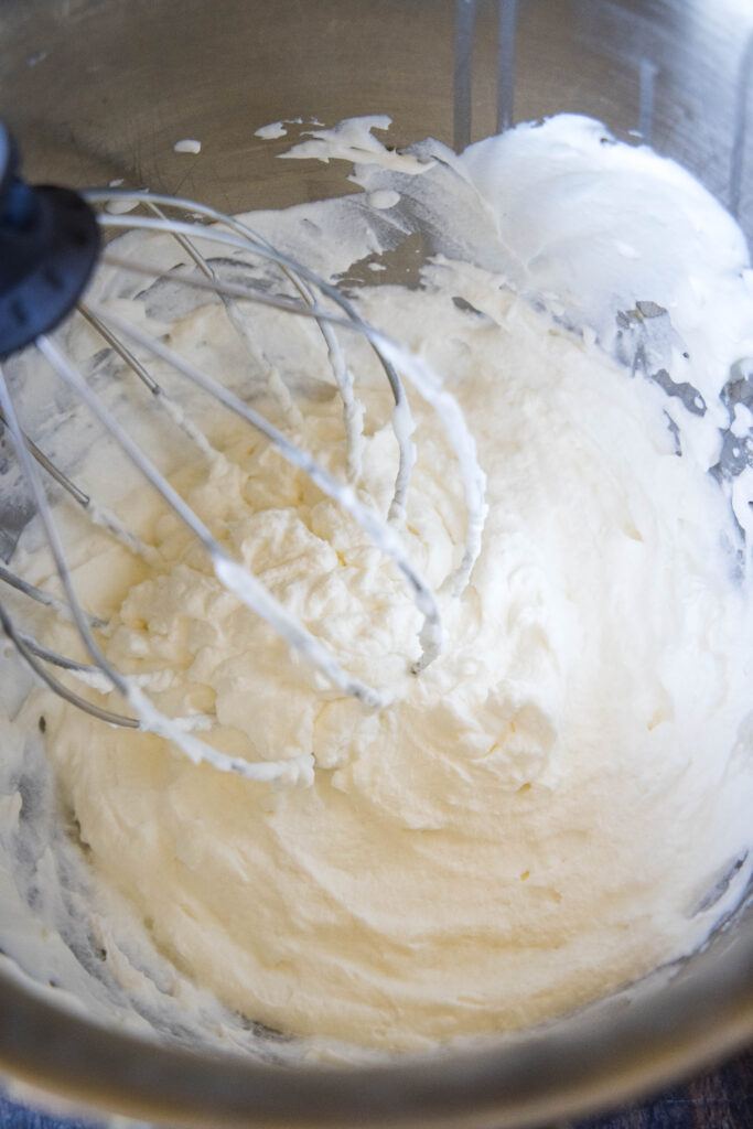 homemade whipped cream in mixing bowl
