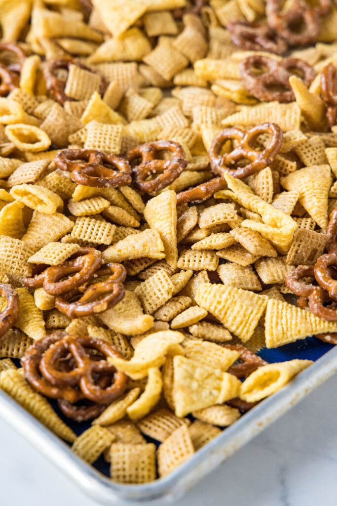 halloween chex mix on a baking tray