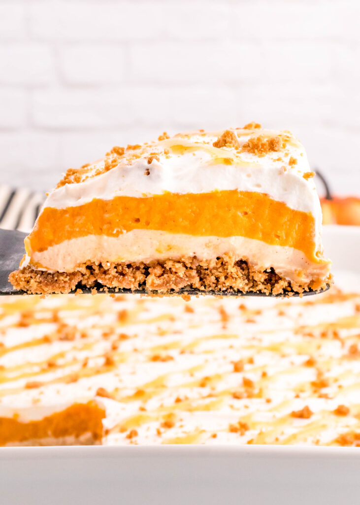 a slice of pumpkin delight on a spatula over the baking tray