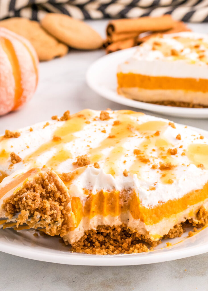 pumpkin delight on a plate with a bite missing