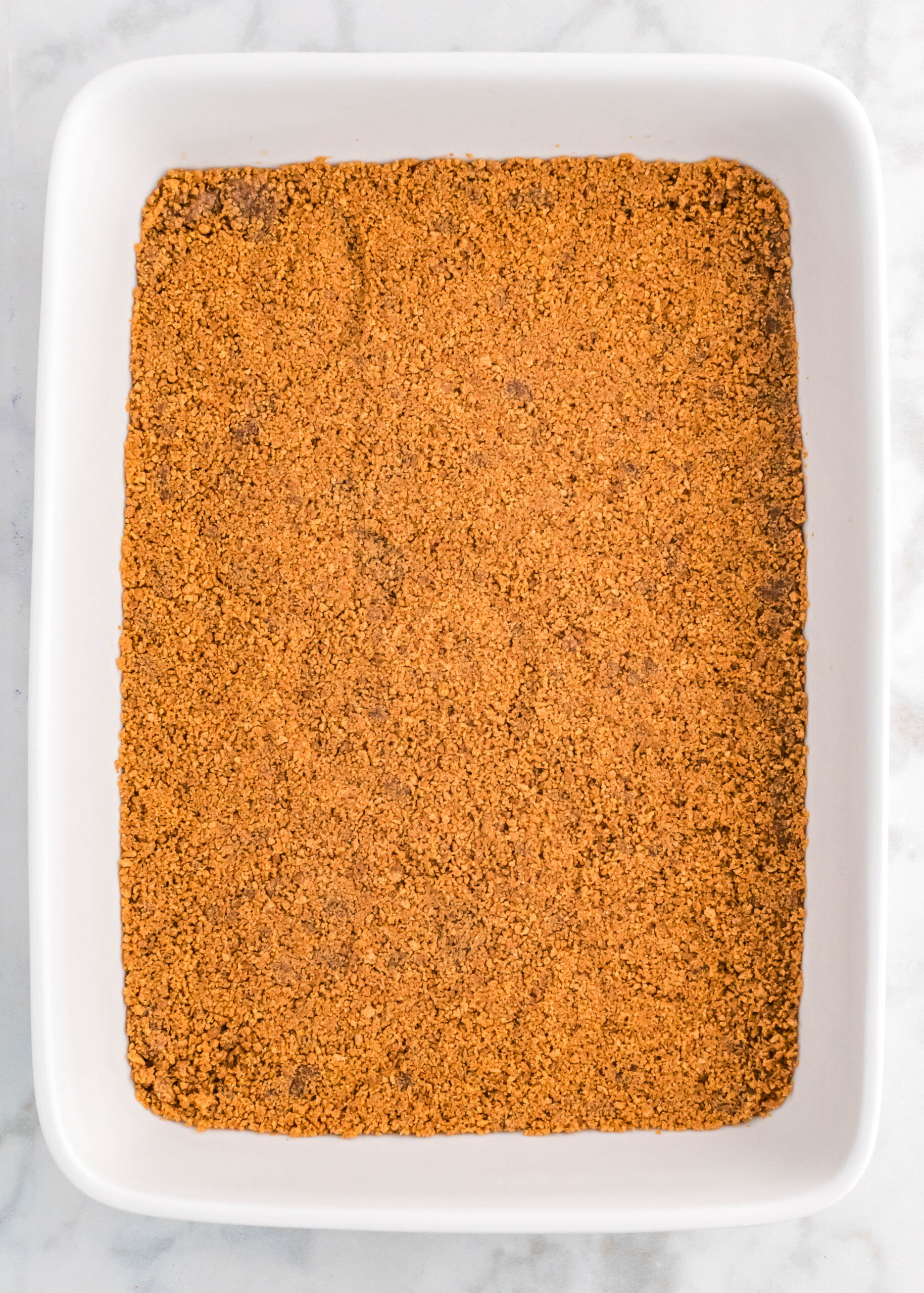 gingersnap crust in a baking pan