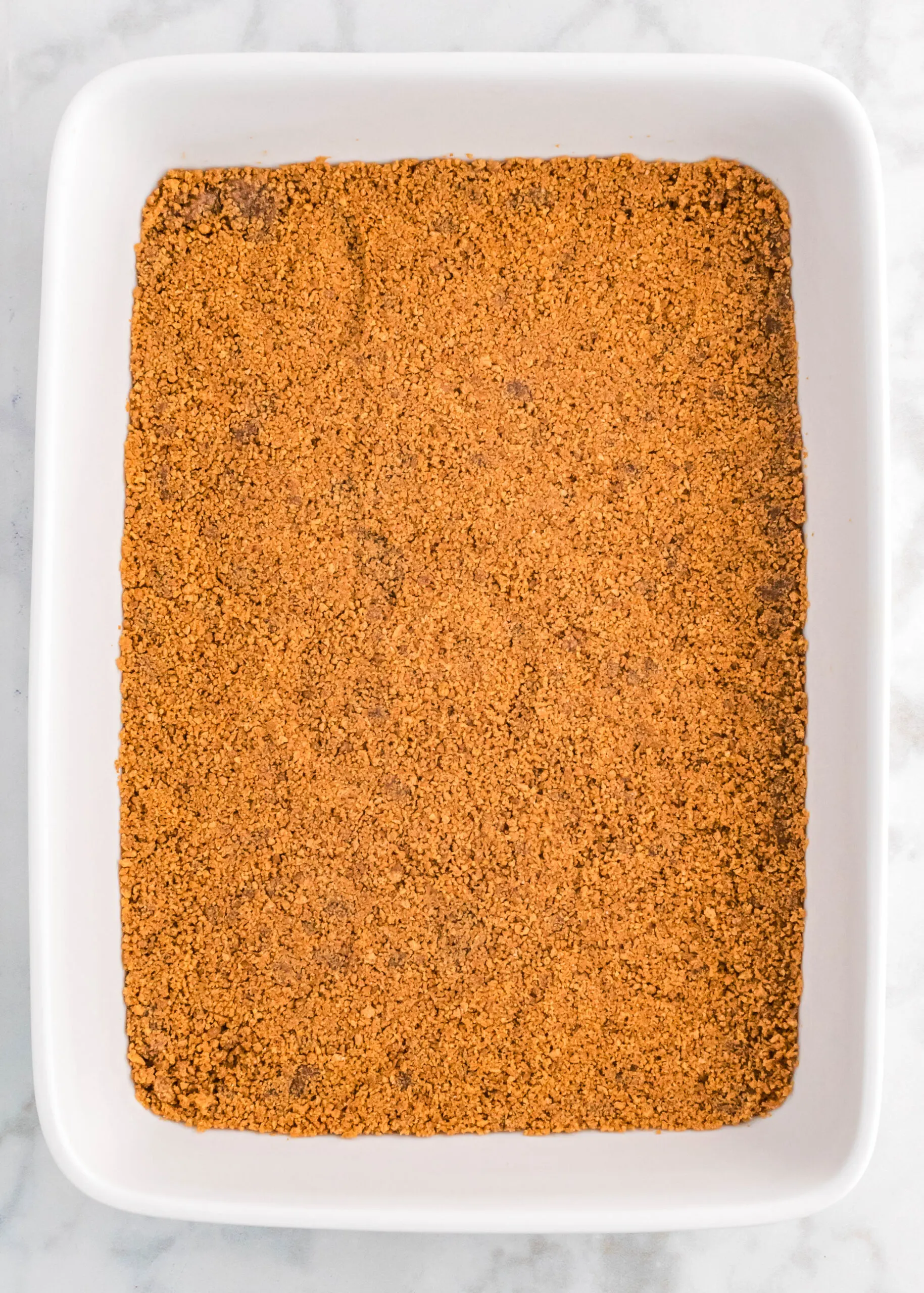 gingersnap crust in a baking pan