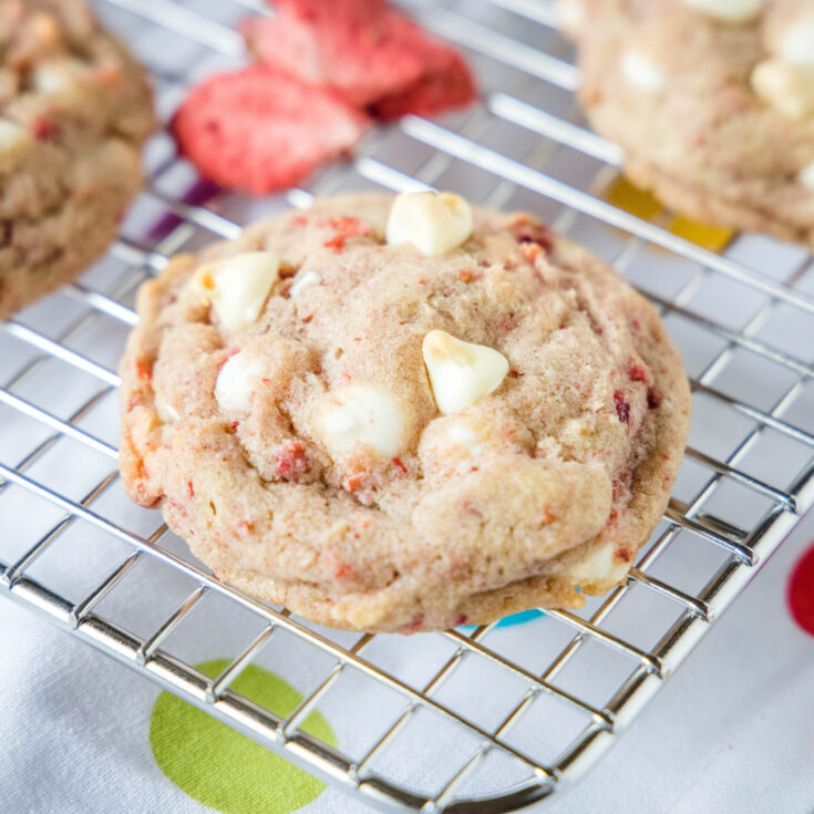 cropped close up strawberry cookie on a cooling rack