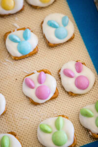 the bunny ears added to the white chocolate on a the pretzels