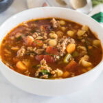 A bowl of Italian sausage soup.