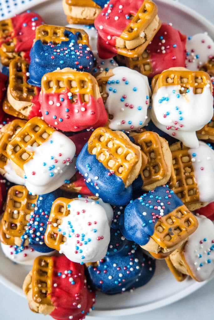 peanut butter pretzel bites on a white plate