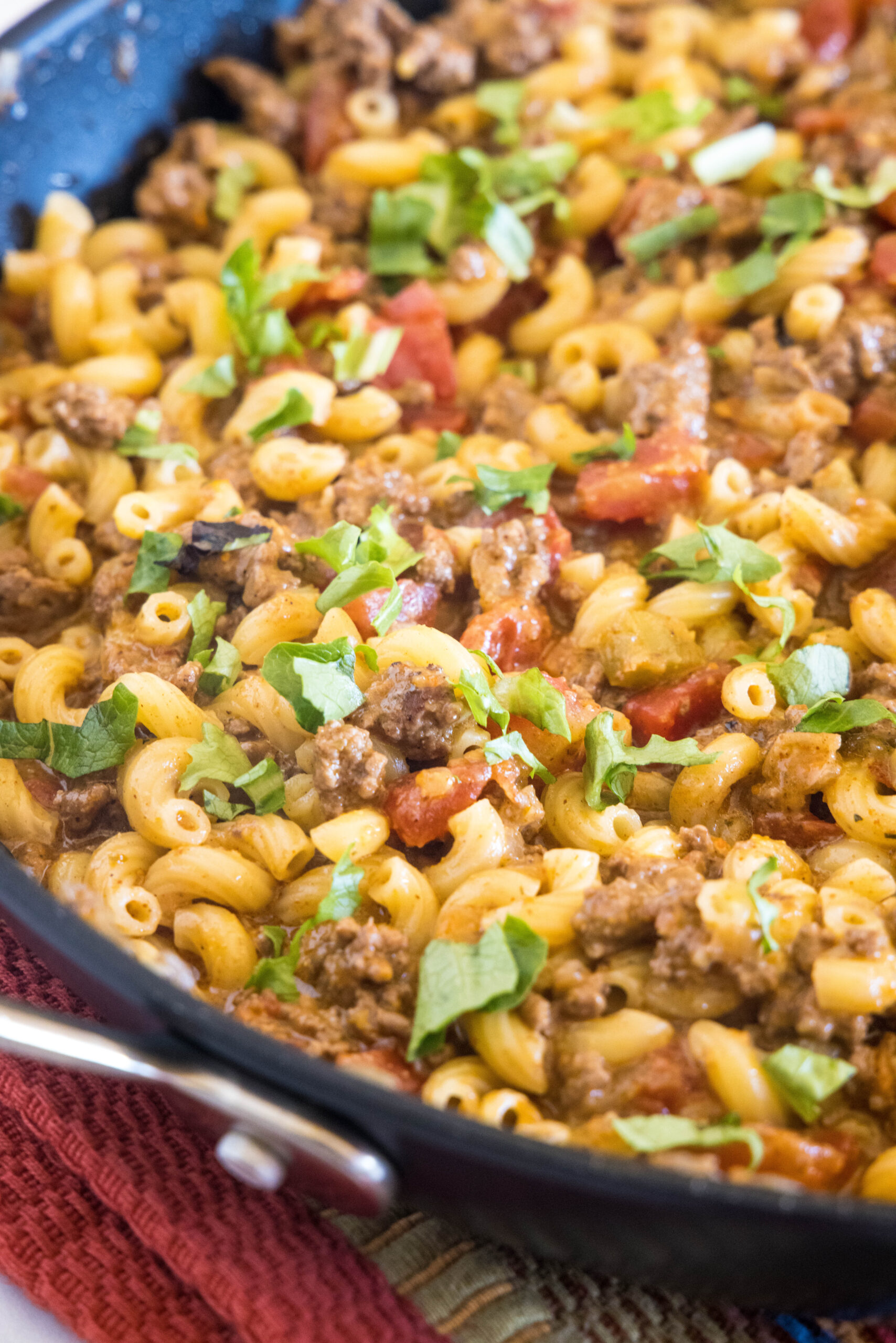 Taco mac and cheese in a large skillet.