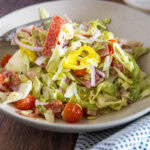 Grinder salad in a large white bowl.
